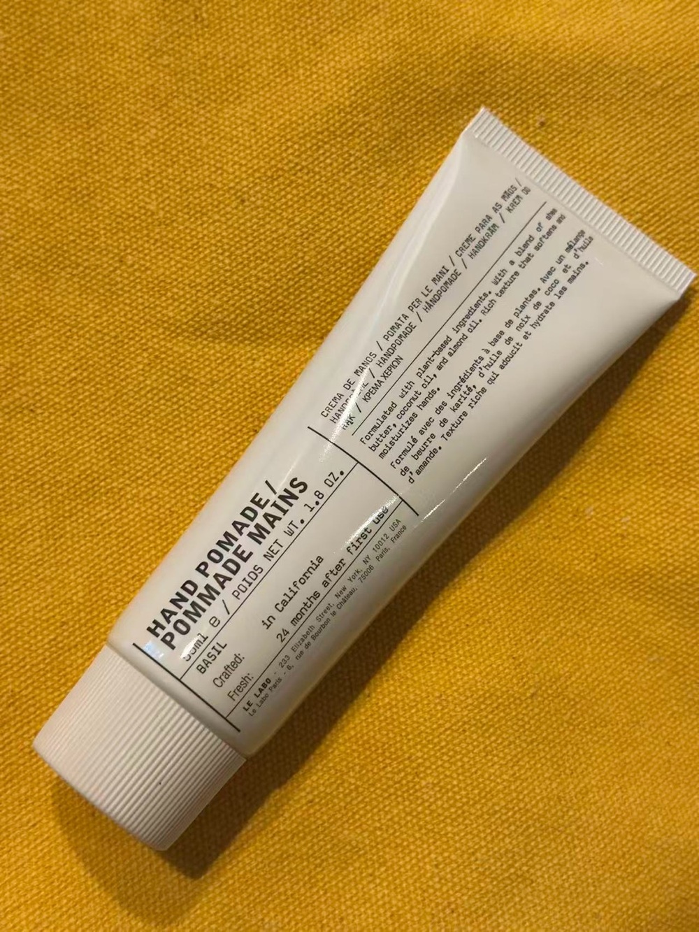 Le Labo White Hand & Foot Care Tube on Yellow